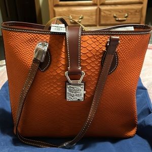 Brand new Dooney & Bourke leather shoulder bag, Orange with Brown trim